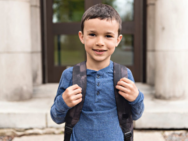 boy is ready to go to school